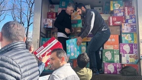 Members of the Turkish American Muslim Cultural Association load supplies to be sent to Turkey to aid the earthquake victims.  The TAMCA Mosque on Levittown Parkway will collect supplies until 9 p.m. Thursday.