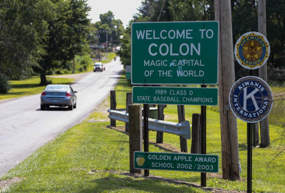 The welcome sign for Colon, seen on Thursday, Aug. 8, 2013, boasts the village as the "Magic Capitol of the World."