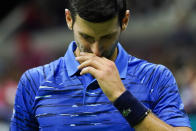 Novak Djokovic, of Serbia, reacts after losing a point against Stan Wawrinka, of Switzerland, during the U.S. Open tennis championships, Sunday, Sept. 1, 2019, in New York. (AP Photo/Eduardo Munoz Alvarez)