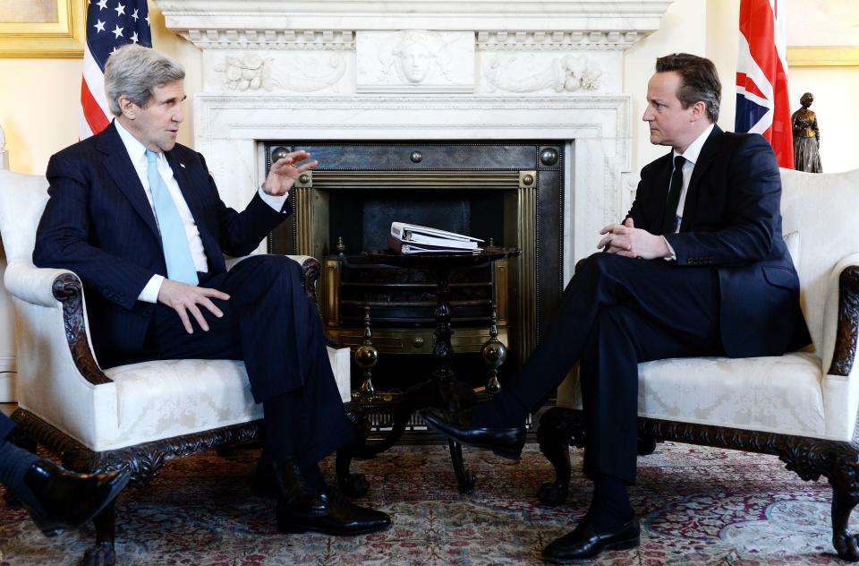 British Prime Minister David Cameron (R) meets with U.S. Secretary of State John Kerry at Downing Street in London on March 14, 2014. Kerry arrived in London on an 11th-hour mission to head off a possible Russian annexation of Crimea on the heels of a breakaway vote by the Ukrainian region. (Photo credit should read ANDY RAIN/AFP/Getty Images)