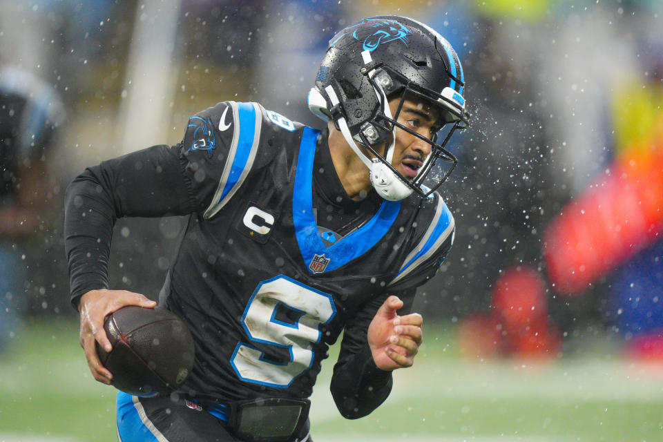 Carolina Panthers quarterback Bryce Young runs against the Atlanta Falcons during the first half of an NFL football game Sunday, Dec. 17, 2023, in Charlotte, N.C. (AP Photo/Jacob Kupferman)