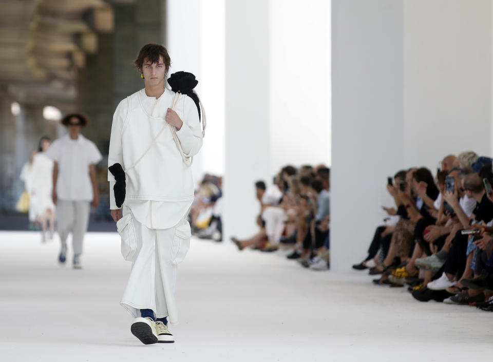 A model wears a creation as part of the Sunnei men's Spring-Summer 2020 collection, unveiled during the fashion week in Milan, Italy, Sunday, June 16, 2019. (AP Photo/Antonio Calanni)