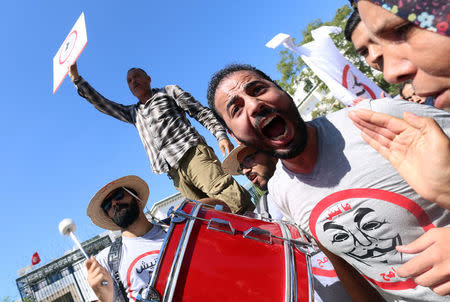 People demonstrate against a bill that would protect from prosecution those accused of corruption in front of Assembly of the Representatives of the People in Tunis, Tunisia September 13, 2017. REUTERS/Zoubeir Souissi