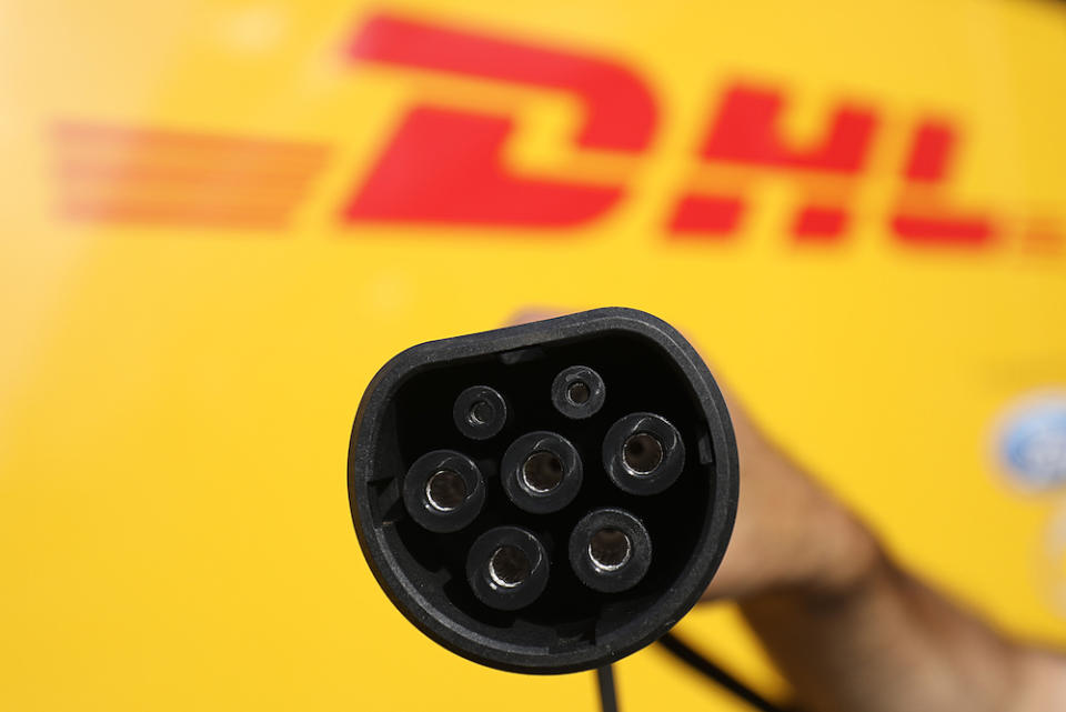 DHL Express has been ditching fuel-based vehicles in favor of an electrified last-mile fleet. Photo: Oliver Berg/dpa via Getty Images.