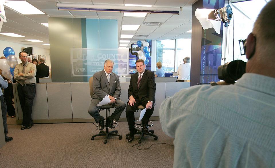 Dick Nourse and Sam Penrod of KSL-TV broadcast live during the open house of the new Utah County News Bureau on Sept. 16, 2004, in Orem. The bureau housed staff of the Deseret Morning News, KSL-TV, KSL Radio and the NAC. | Stuart Johnson, Deseret News