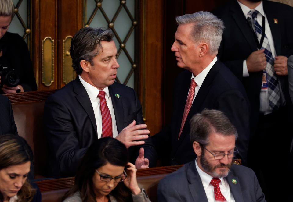 WASHINGTON, DC - JANUARY 05: U.S. House Republican Leader Kevin McCarthy (R-CA) (R) talks to Rep.-elect Andy Ogles (R-TN) in the House Chamber during the third day of elections for Speaker of the House at the U.S. Capitol Building on January 05, 2023 in Washington, DC. The House of Representatives is meeting to vote for the next Speaker after House Republican Leader Kevin McCarthy (R-CA) failed to earn more than 218 votes on several ballots; the first time in 100 years that the Speaker was not elected on the first ballot. (Photo by Chip Somodevilla/Getty Images) ORG XMIT: 775921641 ORIG FILE ID: 1454439205