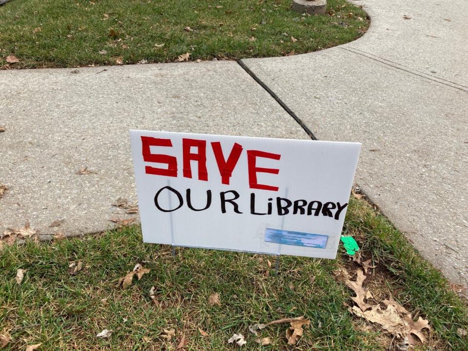 A sign posted outside the Clara Barton Branch Library in Edison