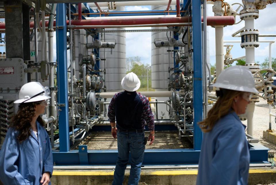 Katie Ellet, left, president of hydrogen energy and mobility for Air Liquide, walks past as facility manager Craig Allen inspects the facility at the largest hydrogen storage facility Sept. 5, 2023 in Beaumont.