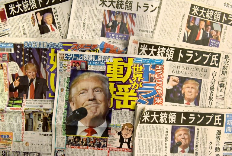 Front pages of Japanese newspapers report on the victory of Donald Trump in the US presidential election in Tokyo on November 10, 2016
