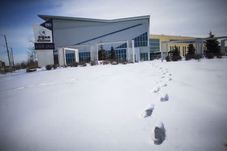 Footsteps lead to the Light Korean Presbyterian Church, where Reverend Hyeon Soo Lim is the head pastor, in Mississauga, Ontario March 5, 2015. REUTERS/Mark Blinch