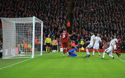 Firmino is given his first goal on a gilded plate by Salah - Credit: Marc Atkins/Offside/Getty Images