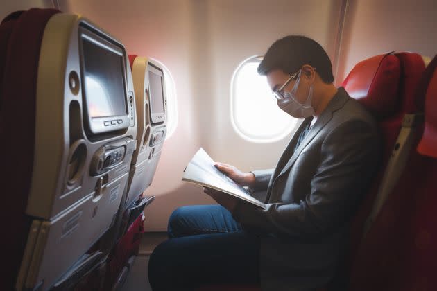 Getting lost in a good book is an ideal way to give your brain a break on a flight.