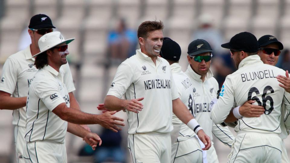 New Zealand’s Tim Southee, centre without cap, celebrates with teammates the dismissal of India’s Jasprit Bumrah during the sixth day of the World Test Championship final cricket match between New Zealand and India.