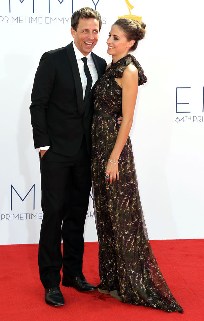 Seth Meyers and Alexi Ashe arrive at the 64th Primetime Emmy Awards at the Nokia Theatre in Los Angeles on September 23, 2012.