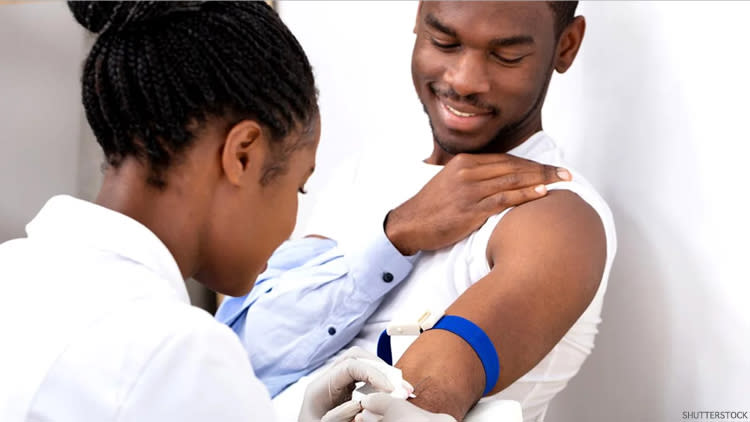 young man donating blood