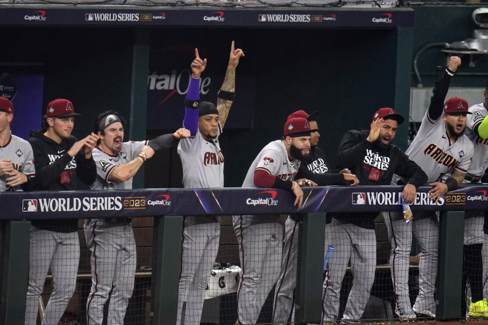 Arizona Diamondbacks celebrate after Gabriel Moreno's home run against the Texas Rangers during the fourth inning in Game 2 of the baseball World Series Saturday, Oct. 28, 2023, in Arlington, Texas. (AP Photo/Julio Cortez)