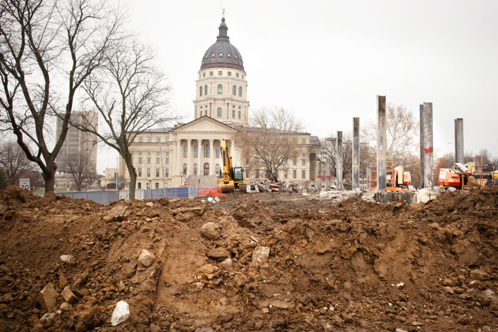 The spot where the 14-story Docking State Office Building stood for 68 years is now a muddy construction site on the west side of the Kansas Statehouse.