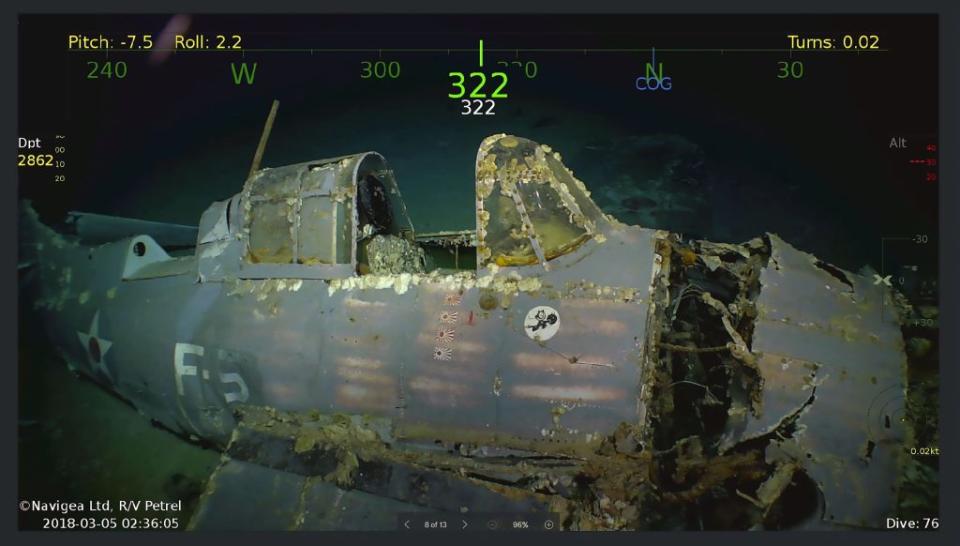 This handout photograph photo obtained March 5, 2018 courtesy of Paul G. Allen shows wreckage from the USS Lexington, a US aircraft carrier which sank during World War II, that has been found in the Coral <a href="https://fortune.com/company/sea/" rel="nofollow noopener" target="_blank" data-ylk="slk:Sea;elm:context_link;itc:0;sec:content-canvas" class="link ">Sea</a>, a search team led by Microsoft co-founder Paul G. Allen announced March 5, 2018. The wreckage was found March 4, 2018 by the team's research vessel, the R/V Petrel, some 3,000 meters (two miles) below the surface more than 500 miles (800 kilometers) off the eastern coast of Australia. Remarkably preserved aircraft could be seen on the seabed bearing the five-pointed star insignia of the US Army Air Forces on their wings and fuselage. / AFP PHOTO / Douglas CURRAN / == RESTRICTED TO EDITORIAL USE / MANDATORY CREDIT: "AFP PHOTO / HO / COURTESY OF PAUL G. ALLEN" / NO MARKETING / NO ADVERTISING CAMPAIGNS / DISTRIBUTED AS A SERVICE TO CLIENTS == (Photo credit should read DOUGLAS CURRAN/AFP via Getty Images)