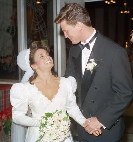 <p>AP Photo/Tim Johnson</p> Mary Lou Retton and Shannon Kelley on their wedding day on Dec. 29, 1990, in Houston, Texas.