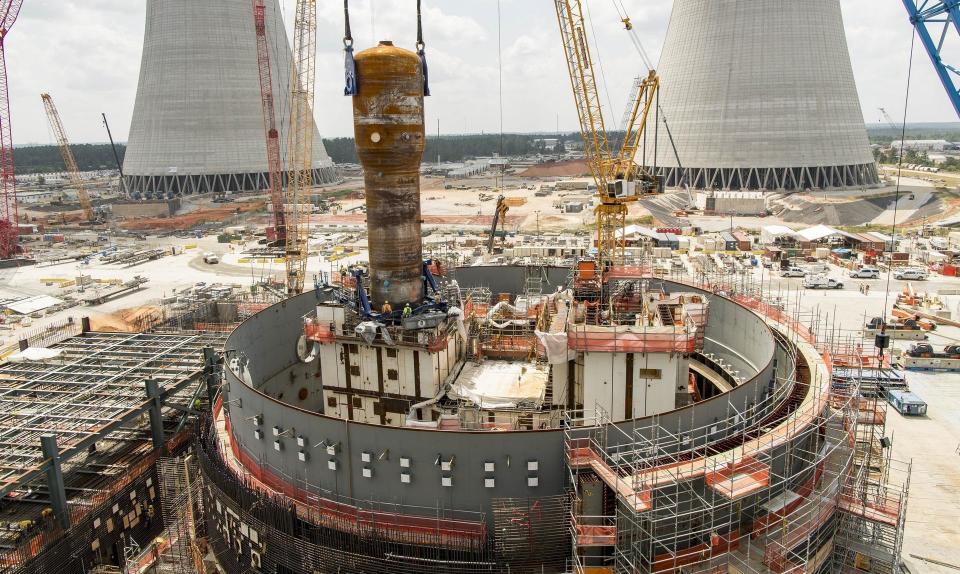 A 1.4 million-pound steam generator is lifted into place as work proceeds on two new nuclear reactors at Plant Vogle near Waynesboro, Ga.