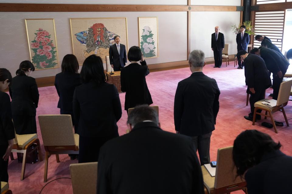 Japan's Emperor Naruhito, center, behind, attends a press conference at the Imperial Palace in advance of his visit to Britain, Wednesday, June 19, 2024, in Tokyo. (AP Photo/Eugene Hoshiko, Pool)