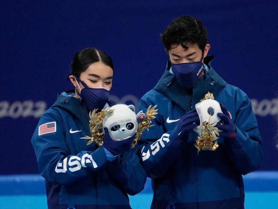 Team USA's Karen Chen (left) and Nathan Chen at the victory ceremony for the figure skating mixed team competition at the 2022 Beijing Olympics.