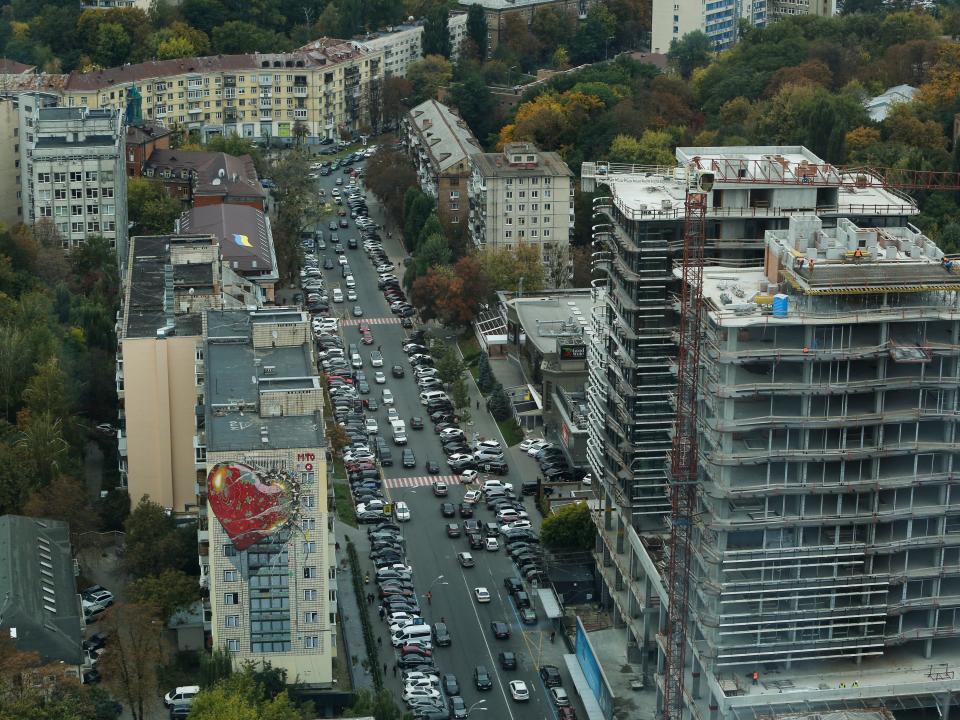 A heart-like mural is seen as an element of the full height painted wall of the block downtown Kyiv, Ukraine, October 9, 2018.