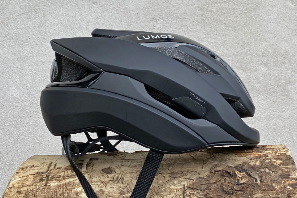 Lumos Ultra Fly Pro MIPS performance road helmet with built-in Firefly taillight, side