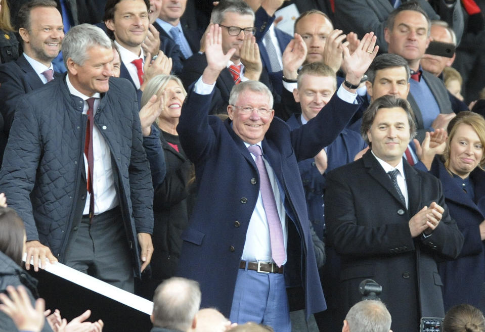 Former Manchester United manager Alex Ferguson waves as he takes his seat on the stands before the English Premier League soccer match between Manchester United and Wolverhampton Wanderers at Old Trafford stadium in Manchester, England, Saturday, Sept. 22, 2018. (AP Photo/Rui Vieira)