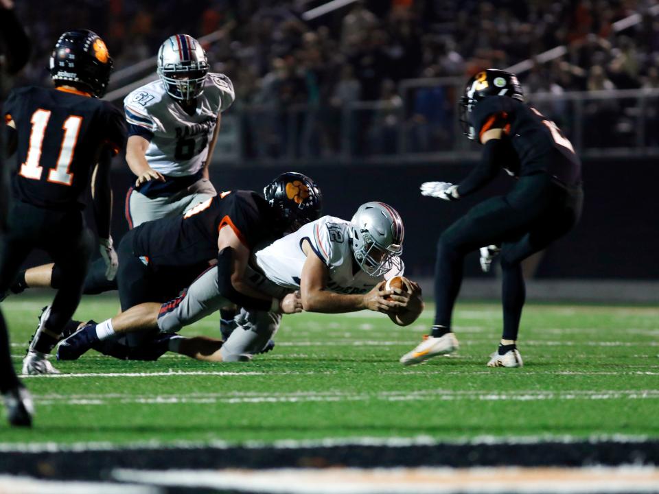 Morgan's Logan Niceswanger lunges for extra yards against New Lexington last week. Niceswanger ran for 268 yards in that victory and will be leading the Raiders' charge.