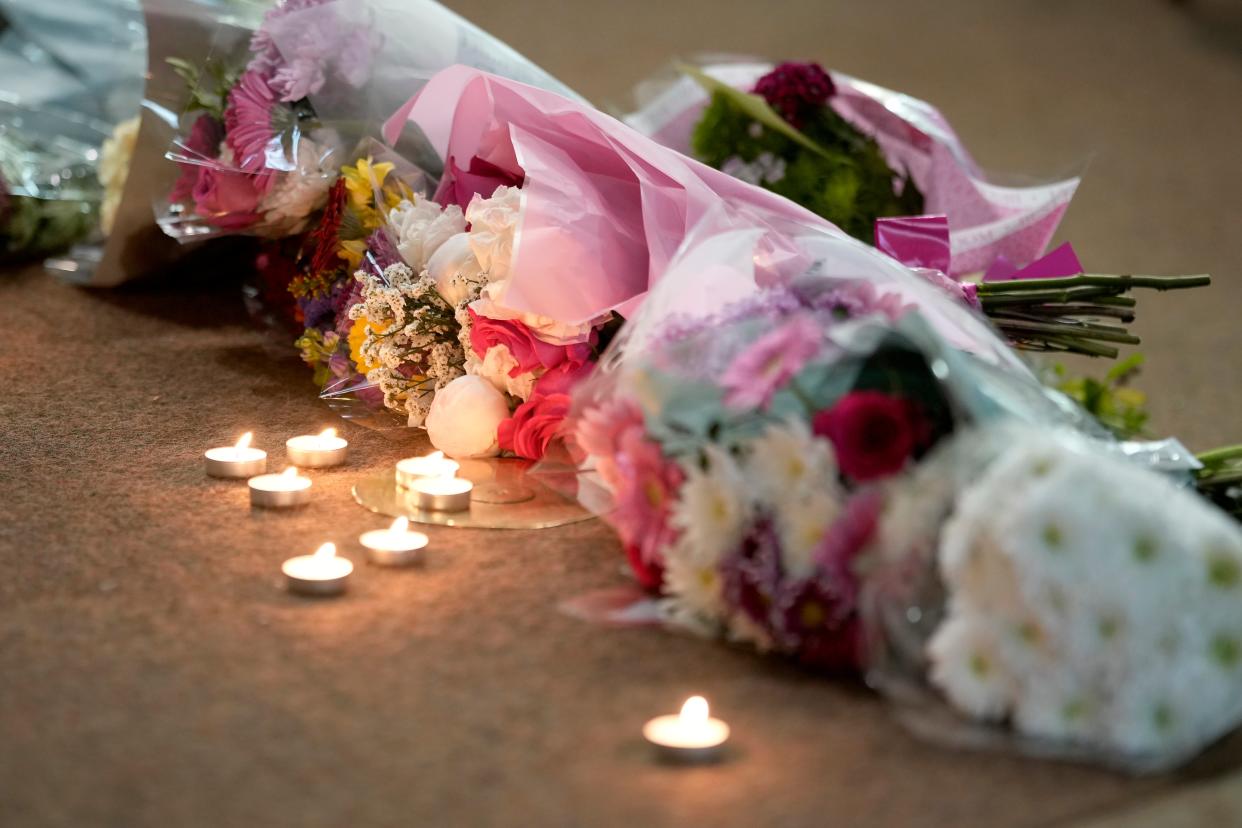 Flowers and candles lay at the altar (Getty Images)