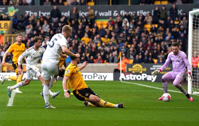 Rasmus Kristensen, centre left, scores Leeds' third goal
