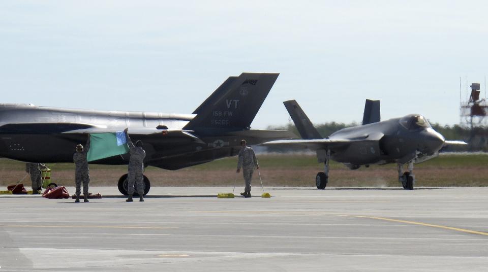 Two F-35 fighter jets are parked after arriving, Thursday, Sept. 19, 2019 at the Vermont Air National Guard base in South Burlington, Vt. The first two of what will become 20 F-35 fighter aircrafts arrived Thursday at The Vermont Air National Guard, the first guard unit to receive the next-generation fighter. (AP Photo/Wilson Ring)