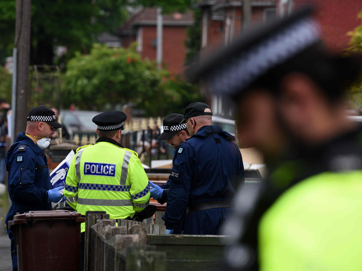 Police officers arrive at a residential property on Elsmore Road in Fallowfield, Manchester, on May 24, 2017,: AFP/Getty Images