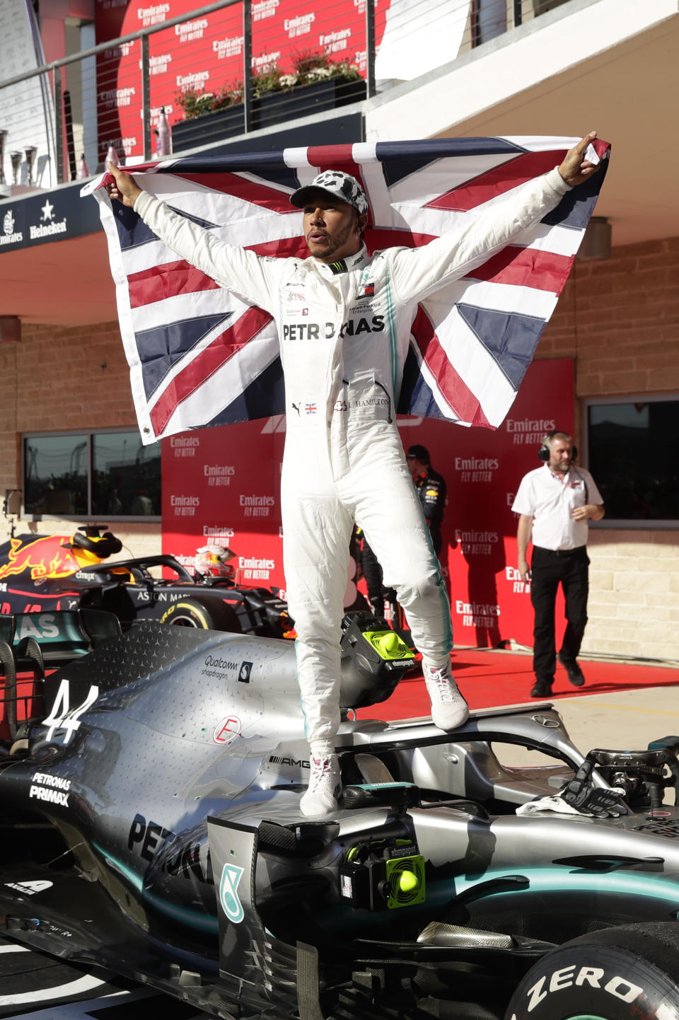 Mercedes driver Lewis Hamilton, of Britain, celebrates after the Formula One U.S. Grand Prix auto race at the Circuit of the Americas, Sunday, Nov. 3, 2019, in Austin, Texas. (AP Photo/Eric Gay)