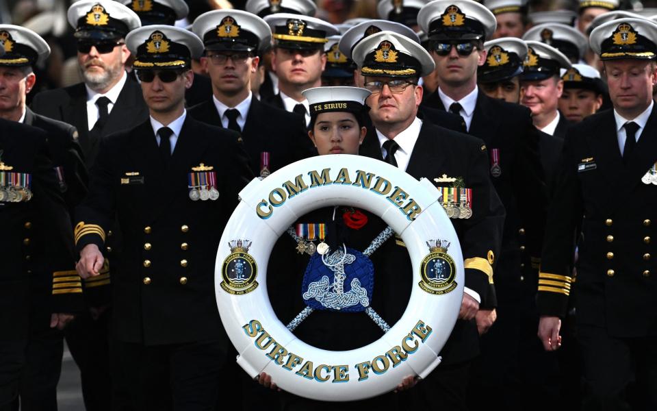 Members of the Austrialian forces parade in Sydney