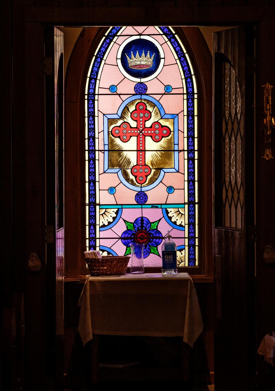 Stained-glass windows line the sanctuary of St. Alban's Episcopal Church in Auburndale. The church is celebrating its 125th anniversary this month.