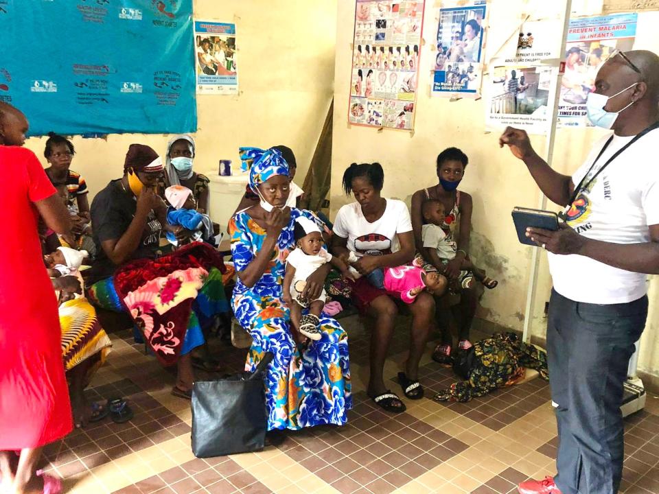 Mothers waiting to be vaccinated at Benguema Community Health Centre, Sierra Leone (UNICEF)