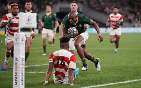 South Africa's Makazole Mapimpi scores a try during the Rugby World Cup quarterfinal match at Tokyo Stadium between Japan and South Africa in Tokyo, Japan, Sunday, Oct. 20, 2019 - Credit: AP