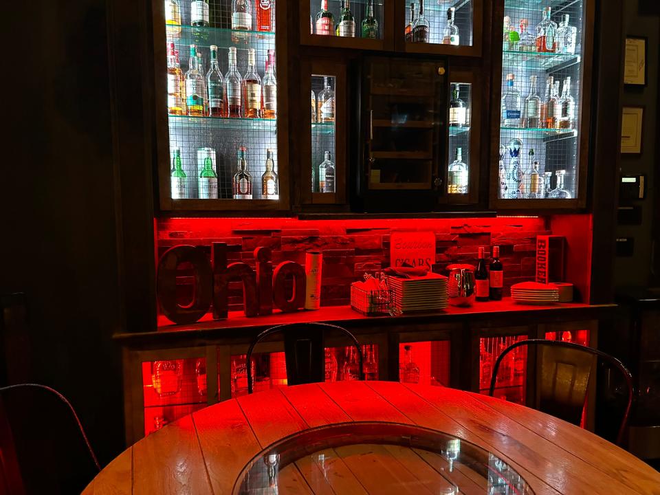 The chic decor in Caston & Main Brew Yard's bourbon room features tables made from bourbon barrels.