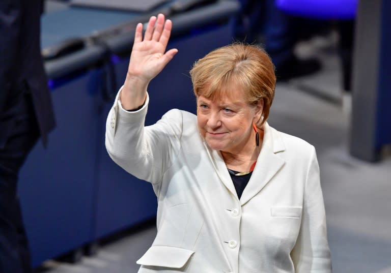 For Merkel, the ceremony marked the end of a painful stretch of post-election paralysis, the deepest crisis of her 12-year career