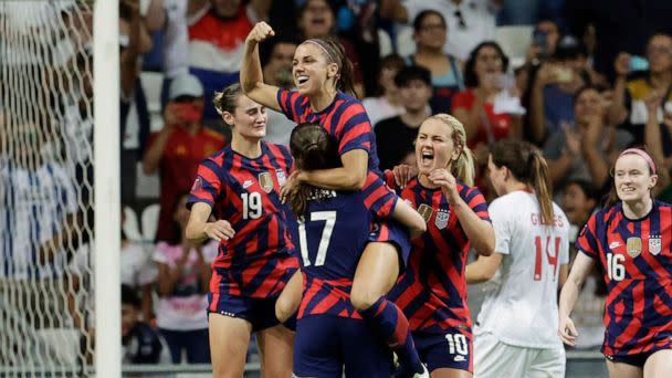 PHOTO: Alex Morgan of the celebrates scoring a goal with teammates, July 18, 2022, at the Concacaf Women Championship - Final - United States v Canada - Estadio BBVA, in Monterrey, Mexico. (Daniel Becerril/Reuters)