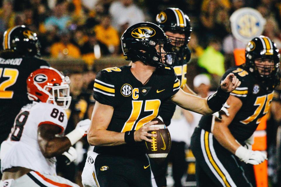 Brady Cook directs a Missouri player during the Tigers' game against No. 1 Georgia on Saturday, Oct. 1, 2022, at Faurot Field.