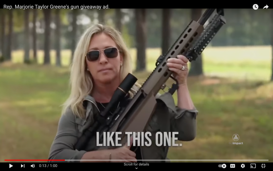 <span class="caption">In this 2022 political ad, Marjorie Taylor Greene is wearing dark sunglasses and carrying a high-powered rifle.</span> <span class="attribution"><a class="link " href="https://www.youtube.com/watch?v=EhT9Yp1tK1Q" rel="nofollow noopener" target="_blank" data-ylk="slk:Marjorie Taylor Greene;elm:context_link;itc:0;sec:content-canvas">Marjorie Taylor Greene</a></span>