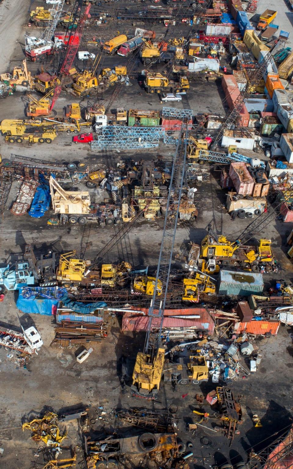 Meanwhile clean-up crews continue clearing the tonnes of wreckage strewn across the port - WAEL HAMZEH/EPA-EFE/Shutterstock