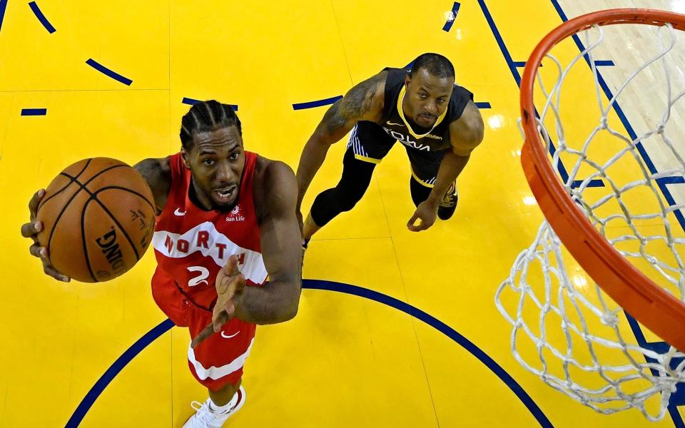 Basketball Toronto Raptors v Golden State Warriors Original description: Jun 13, 2019; Oakland, CA, USA; Toronto Raptors forward Kawhi Leonard (2) shoots the ball against Golden State Warriors guard Andre Iguodala (9) in game six of the 2019 NBA Finals at Oracle Arena