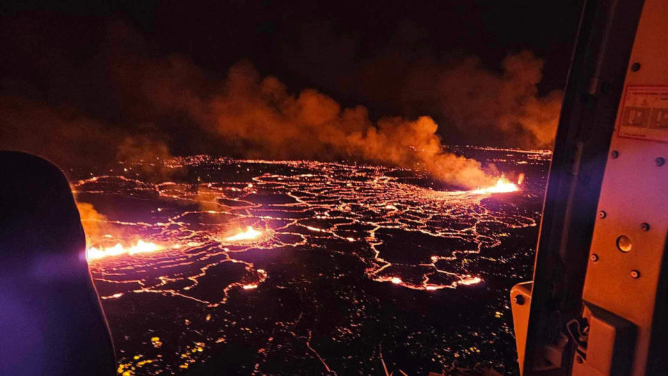 A view of lava after volcano eruption located close to Sundhnukagigar from a helicopter above fissures broken in the ground and molten lava appears.