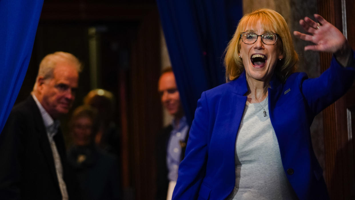 Sen. Maggie Hassan (D-NH) greets supporters with her family after her midterm victory during her election night watch party at the Puritan Conference Center on November 8, 2022 in Manchester, New Hampshire. (Sophie Park/Getty Images)