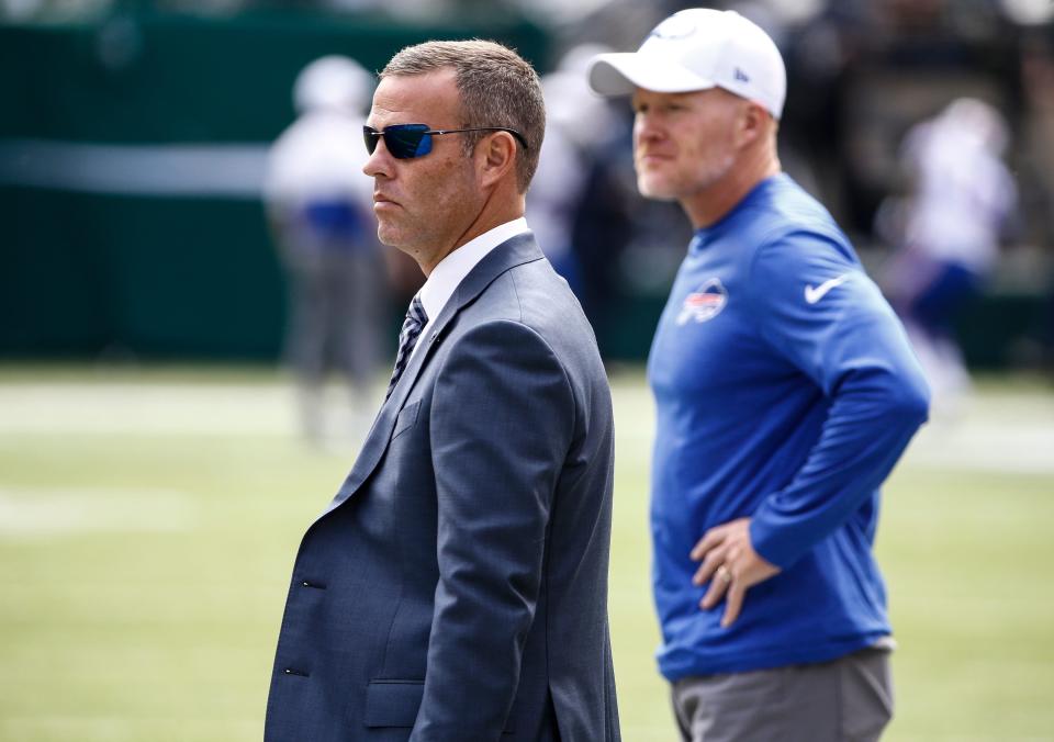Buffalo Bills general manager Brandon Beane and head coach Sean McDermott, shown watching warmups prior to the season opener against the New York Jets, are in Mobile, Alabama, for the Senior Bowl this week.