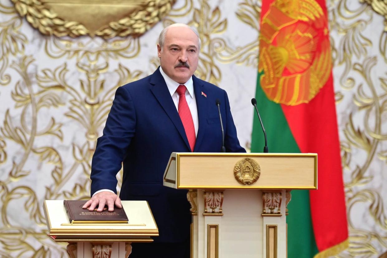 <span class="caption">Belarusian president Alexander Lukashenko takes the oath of office during an unannounced inauguration ceremony Sept. 23 in Minsk.</span> <span class="attribution"><a class="link " href="https://www.gettyimages.com/detail/news-photo/belarus-president-elect-alexander-lukashenko-takes-oath-of-news-photo/1228665640?adppopup=true&uiloc=thumbnail_more_search_results_adp" rel="nofollow noopener" target="_blank" data-ylk="slk:Andrei Stasevich\TASS via Getty Images;elm:context_link;itc:0;sec:content-canvas">Andrei Stasevich\TASS via Getty Images</a></span>